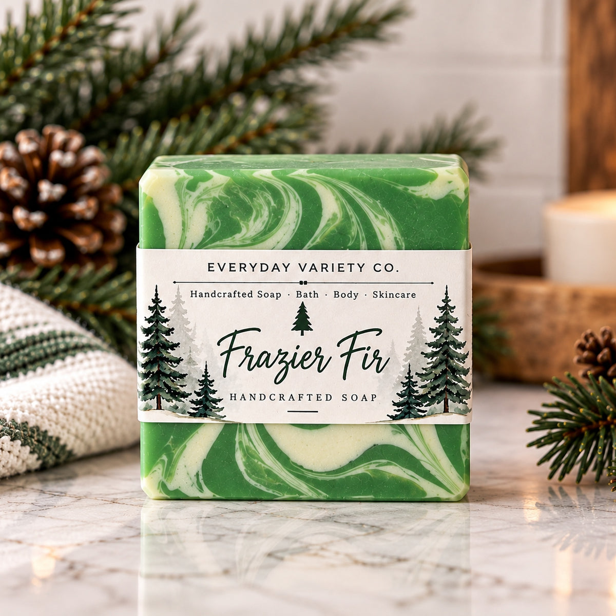 Frazier Fir Soap collection showing massage oval, swirled square, and solid rectangle styles in forest green