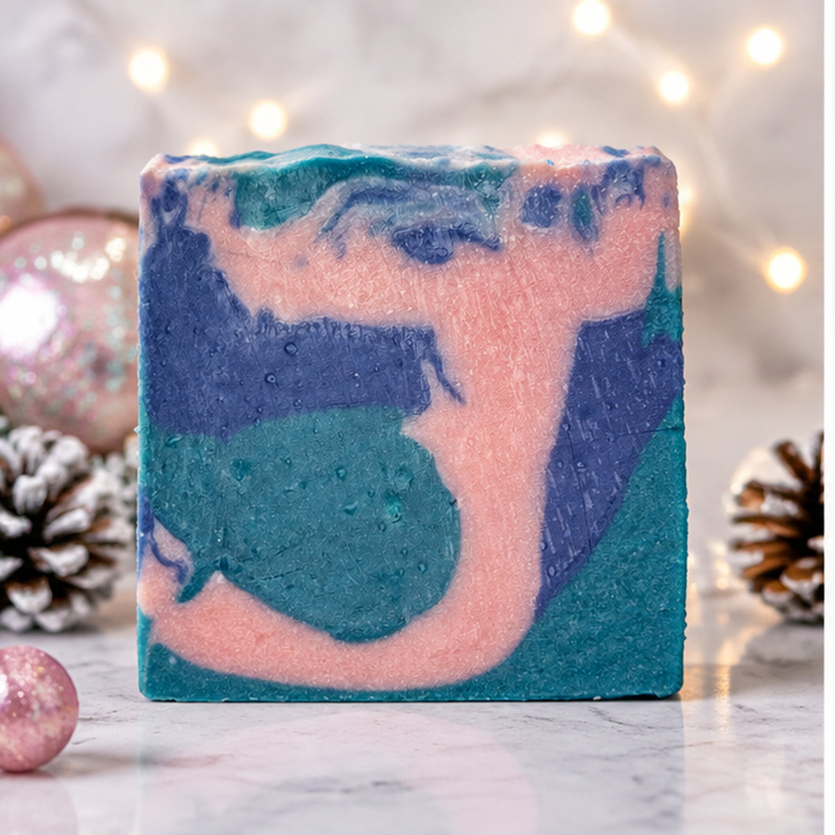 Reindeer Magic Soap unlabeled close-up showing handcrafted teal purple and pink swirl