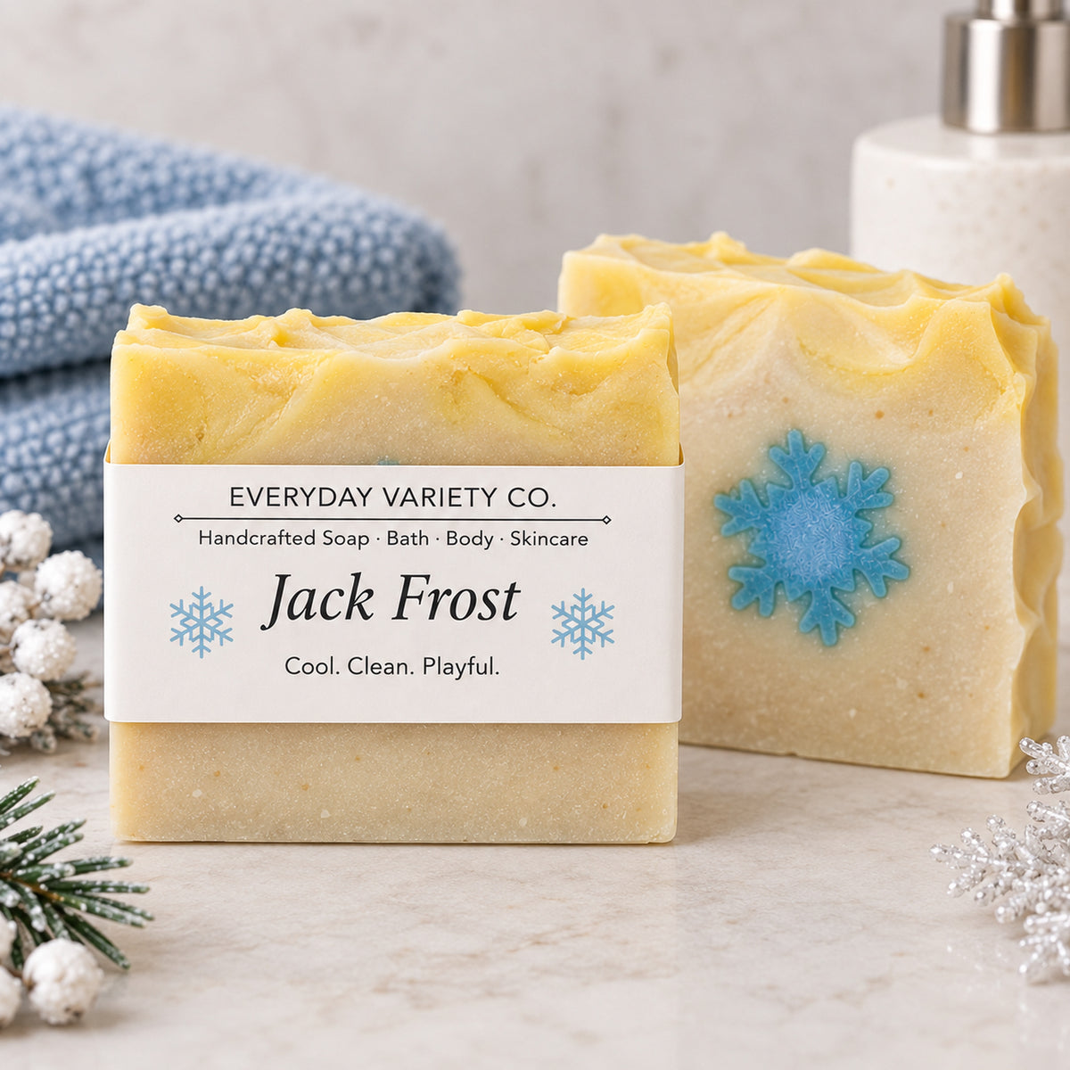 Jack Frost Soap with label, styled with winter botanicals and blue snowflake detail