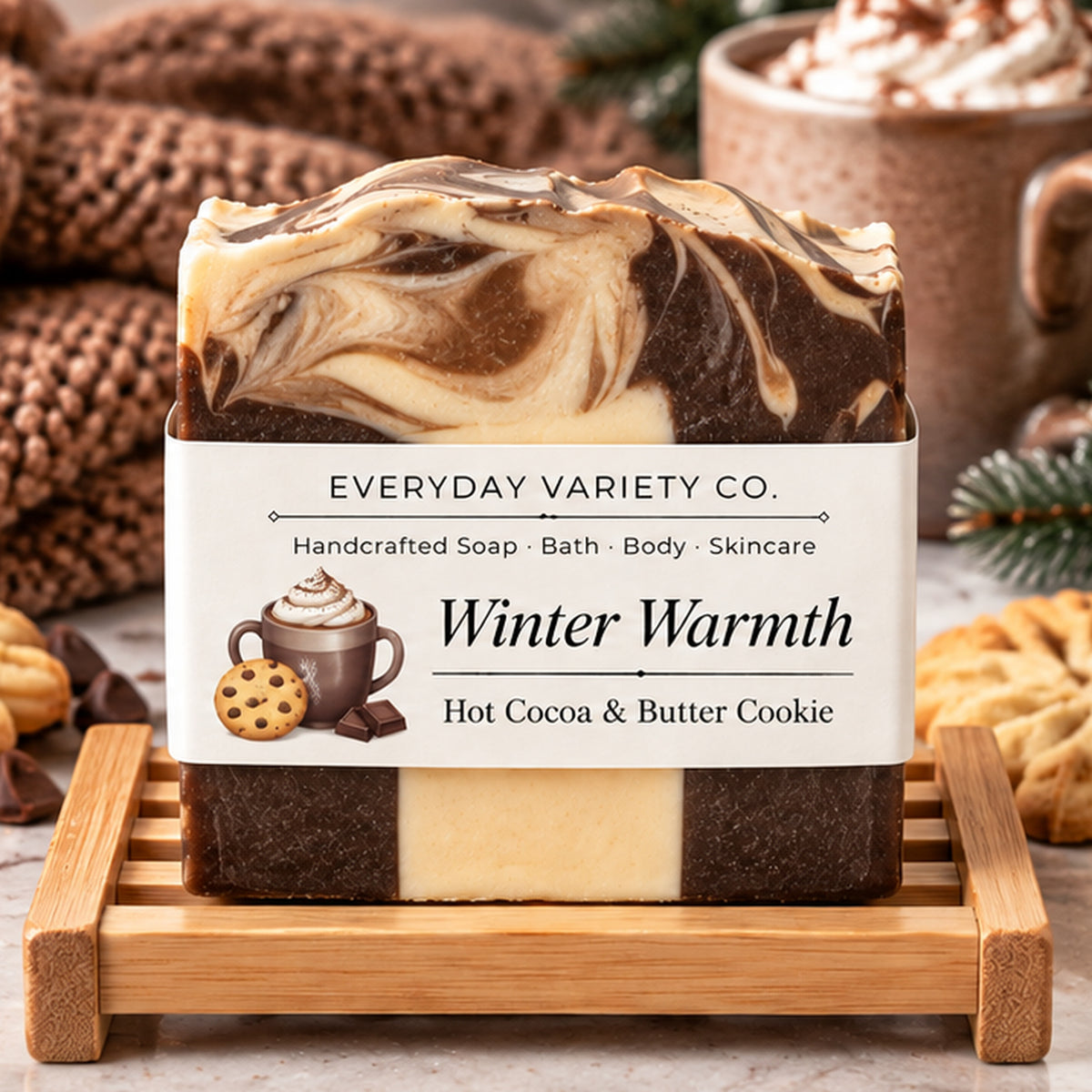 Winter Warmth Soap with EVCo label on wood soap dish, styled with hot cocoa and butter cookies